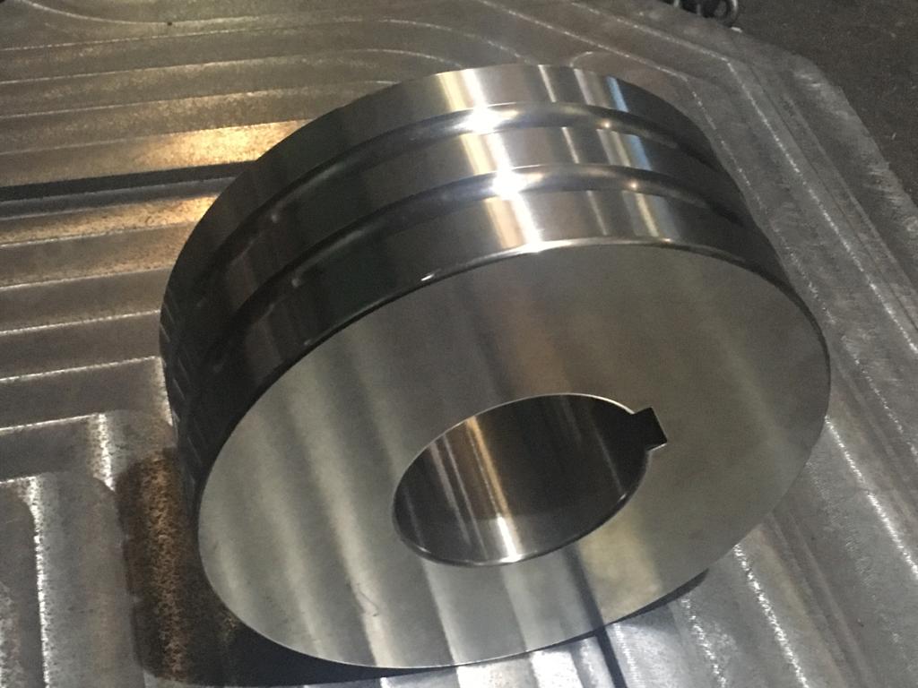 Feed roller for automobile spring